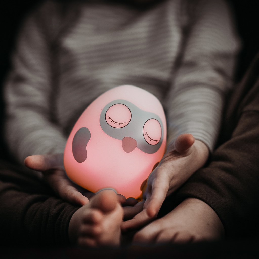 Ooly sleep trainer clock glowing red